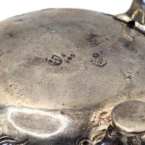 522 - A PAIR OF 18TH CENTURY GEORGE II SILVER SALTS
Hallmarked London, having repoussé chased floral and l... 