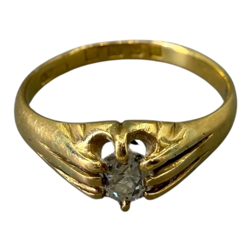 523 - A GEORGE V 18CT GOLD AND DIAMOND RING
Hallmarked London, 1932, having a central oval old European cu... 
