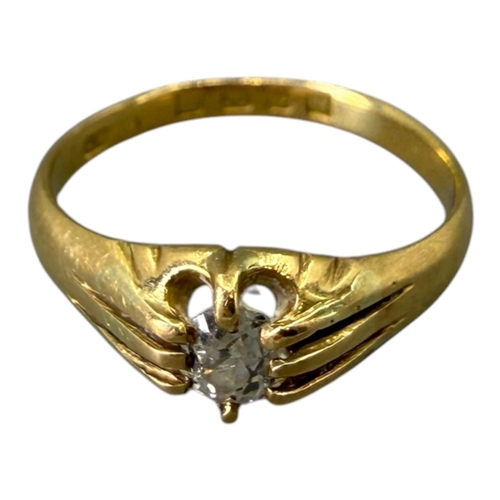 523 - A GEORGE V 18CT GOLD AND DIAMOND RING
Hallmarked London, 1932, having a central oval old European cu... 