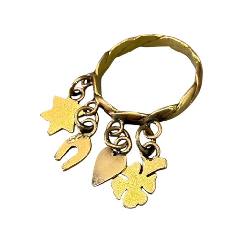 527 - A 20TH CENTURY CONTINENTAL YELLOW METAL ‘LUCK’ CHARM RING (YELLOW METAL TESTS AS 18CT)
Charms compri... 