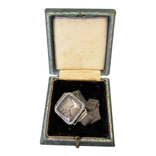 543 - AN ART DECO WHITE METAL AND WHITE SAPPHIRE LADIES’ WRISTWATCH, CIRCA 1920 (WHITE METAL TESTS AS PLAT... 