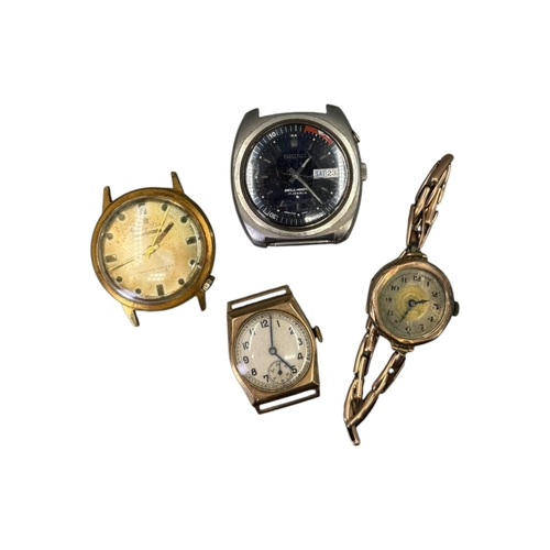 545 - TWO 9CT GOLD CASED WRISTWATCHES
Together with a Matthey Doret watch and a Seiko watch. 
(gold watche... 