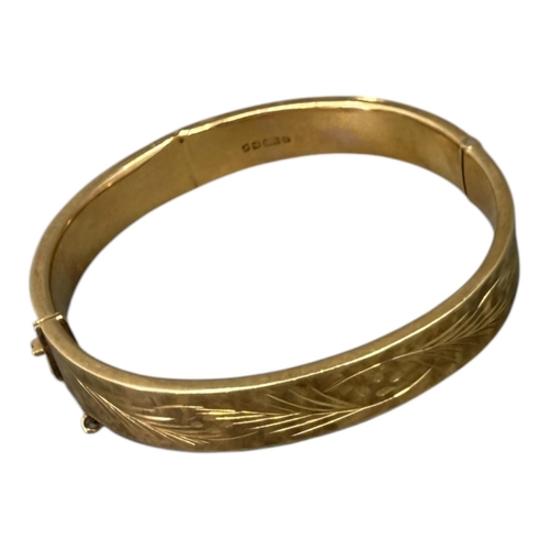 551 - JOSEPH SMITH & SONS LTD, A VINTAGE 9CT GOLD BANGLE
Hallmarked Birmingham, 1971, hinged oval form, ha... 