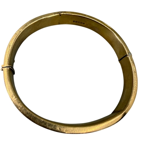 551 - JOSEPH SMITH & SONS LTD, A VINTAGE 9CT GOLD BANGLE
Hallmarked Birmingham, 1971, hinged oval form, ha... 