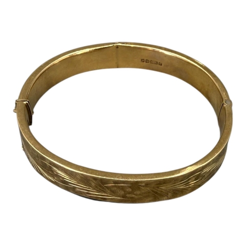 551 - JOSEPH SMITH & SONS LTD, A VINTAGE 9CT GOLD BANGLE
Hallmarked Birmingham, 1971, hinged oval form, ha... 