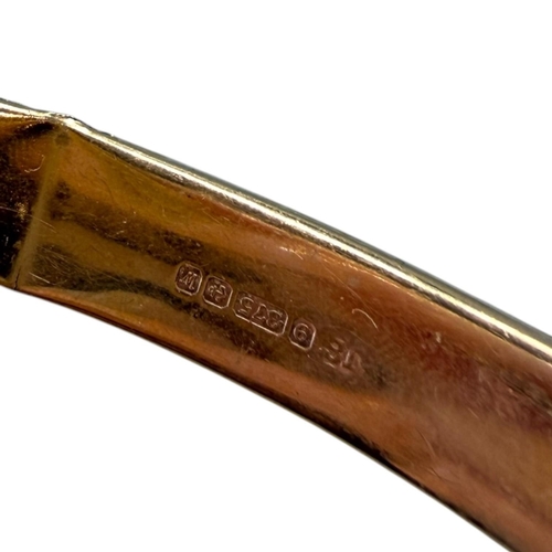 551 - JOSEPH SMITH & SONS LTD, A VINTAGE 9CT GOLD BANGLE
Hallmarked Birmingham, 1971, hinged oval form, ha... 