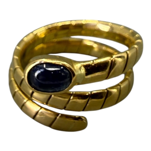 559 - MANNER OF BVLGARI/BULGARI, 20TH CENTURY DESIGNER STYLE 18CT GOLD AND BLUE LABRODITE ‘SERPENTI’ RING
... 