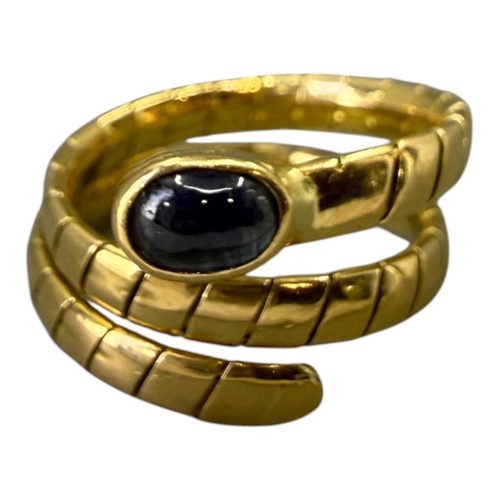 559 - MANNER OF BVLGARI/BULGARI, 20TH CENTURY DESIGNER STYLE 18CT GOLD AND BLUE LABRODITE ‘SERPENTI’ RING
... 