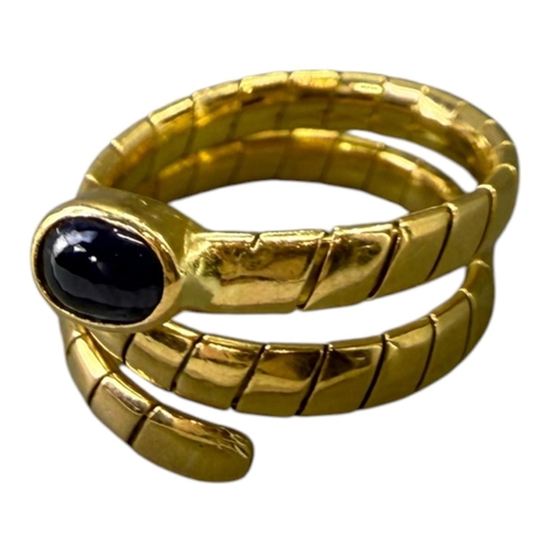 559 - MANNER OF BVLGARI/BULGARI, 20TH CENTURY DESIGNER STYLE 18CT GOLD AND BLUE LABRODITE ‘SERPENTI’ RING
... 