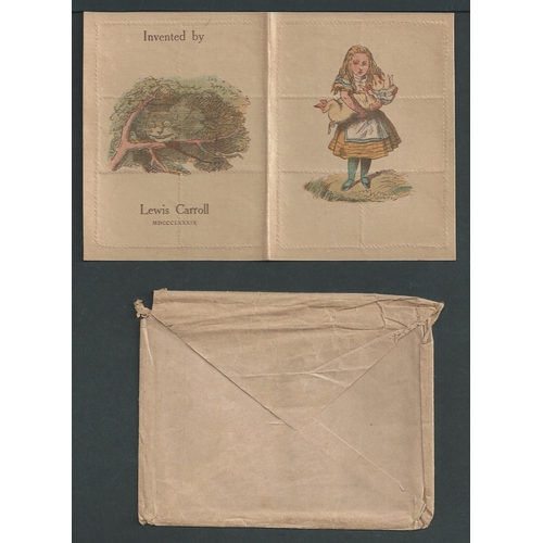 854 - The Wonderland Postage-Stamp Case within its card folder, both depicting Alice on the cover, togethe... 