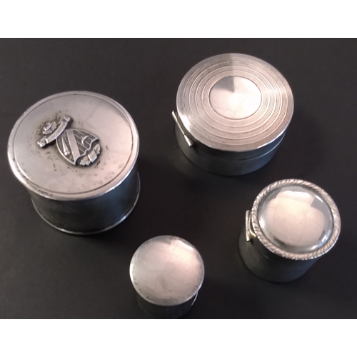 3 - Silver. Circular stamp coil dispensers, 46x33mm with a shield (motto 
