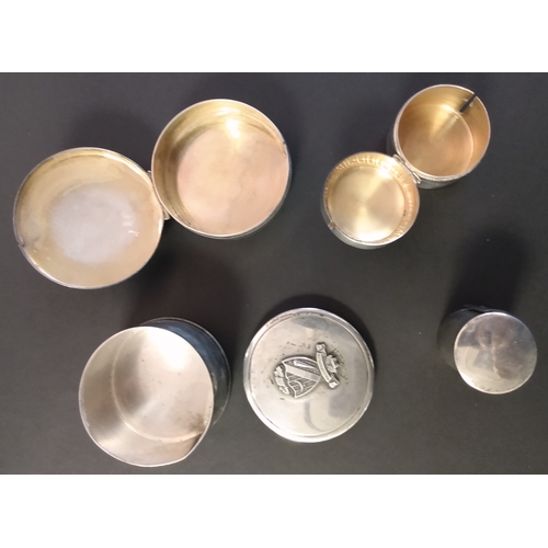 3 - Silver. Circular stamp coil dispensers, 46x33mm with a shield (motto 