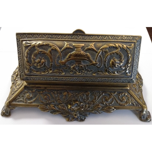 5 - Brass. A large and heavy brass desk stamp box, lifting lid revealing five stamp compartments, ornate... 