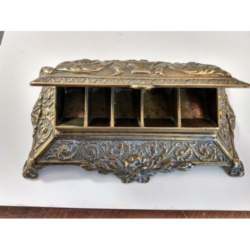 5 - Brass. A large and heavy brass desk stamp box, lifting lid revealing five stamp compartments, ornate... 