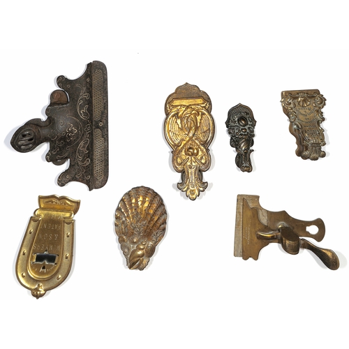 14 - Letter Clips. c.1870 Victorian letter clips, one made of iron, the others all brass, five bearing th... 