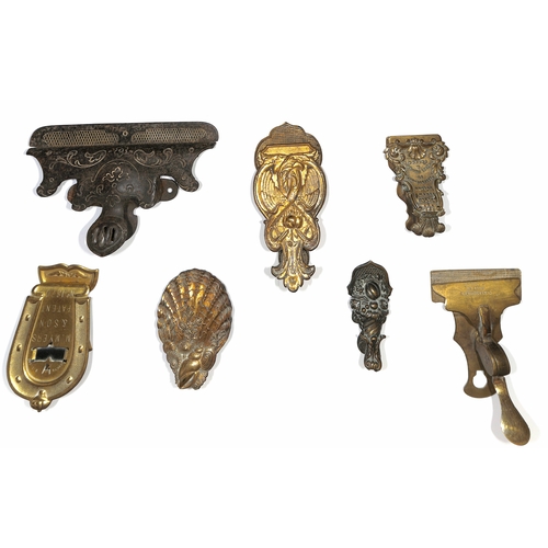14 - Letter Clips. c.1870 Victorian letter clips, one made of iron, the others all brass, five bearing th... 