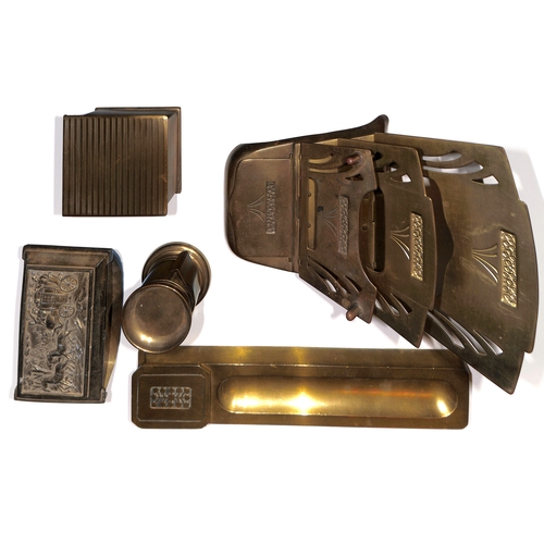 6 - Brass. Desk accessories comprising pen tray with stamp box at one end, stylised leaf pattern to the ... 