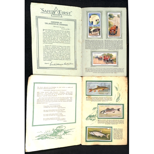 41 - Cigarette Cards. A large quantity in several albums and loose including Players, Wills, Churchmans, ... 