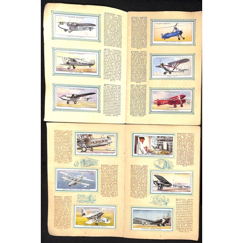 41 - Cigarette Cards. A large quantity in several albums and loose including Players, Wills, Churchmans, ... 