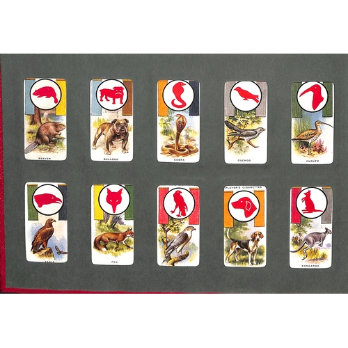 41 - Cigarette Cards. A large quantity in several albums and loose including Players, Wills, Churchmans, ... 