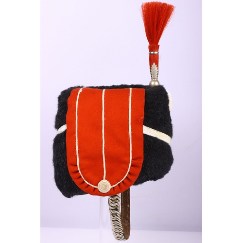 79 - British Other Ranks Yeomanry Busby, good example of a black fur other ranks Yeomanry busby with scar... 