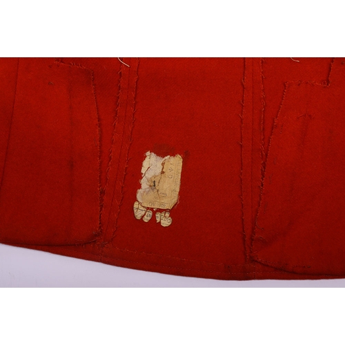 106 - Victorian scarlet wool tunic with blue cloth collar, epaulettes and facing. Bearing gold lace rank c... 