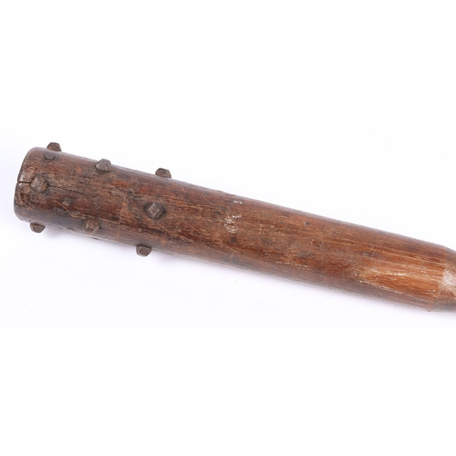 258 - WW1 British Workshop Made Trench Club. A WW1 wooden trench club studded with hobnails with a weighte... 