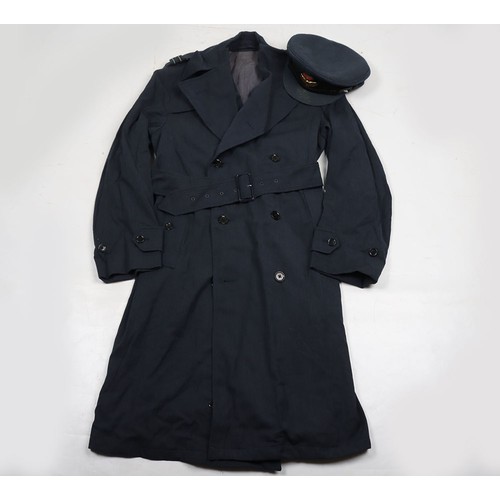 900 - RAF Officer's Peaked Cap & Rain Coat. Cold War. A fair condition example of a RAF Officers peake... 