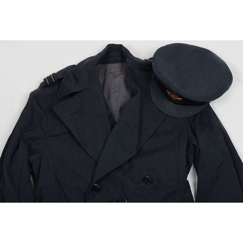 900 - RAF Officer's Peaked Cap & Rain Coat. Cold War. A fair condition example of a RAF Officers peake... 