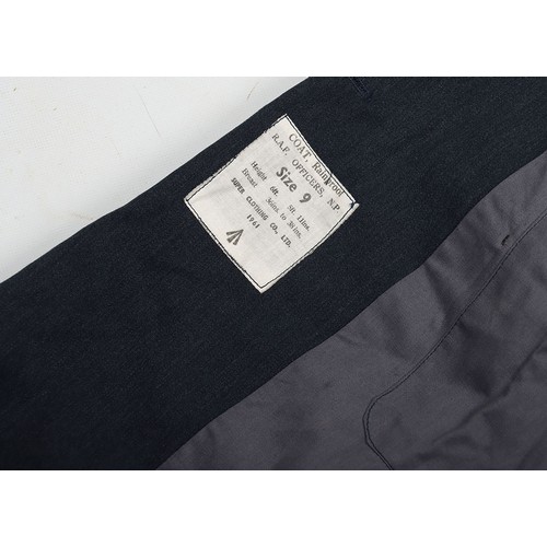 900 - RAF Officer's Peaked Cap & Rain Coat. Cold War. A fair condition example of a RAF Officers peake... 