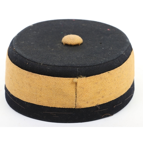 4 - Corporals Pill Box Cap. ORs Pill Box made from dark blue cloth with yellow band, yellow button to to... 