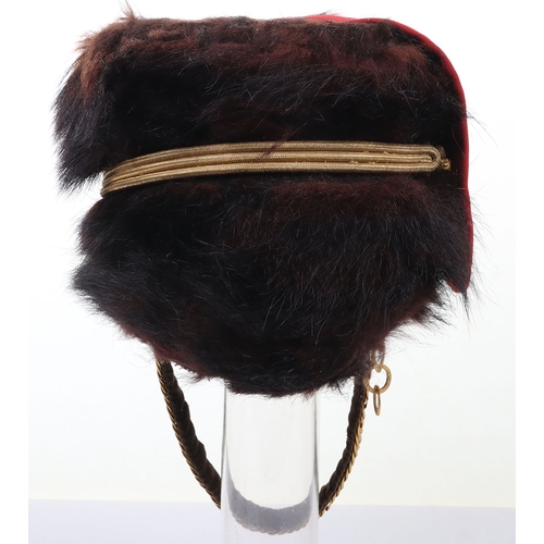 10 - Hussar Officers Busby. Officers fur busby with plain scarlet bag, fitted with oval gilt cord cockade... 