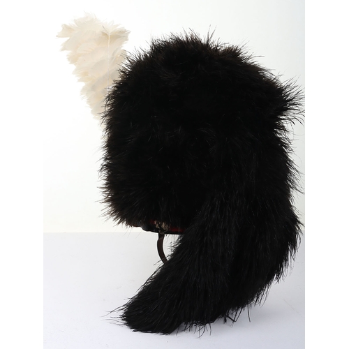 22 - Highlanders ostrich feather bonnet with 4 tails, silk rosette, diced band with velvet edge, and blac... 