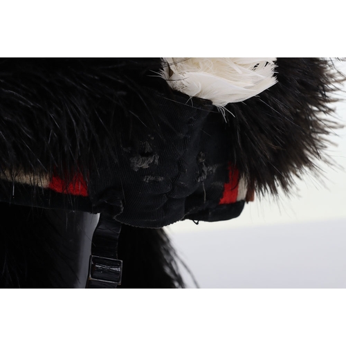 22 - Highlanders ostrich feather bonnet with 4 tails, silk rosette, diced band with velvet edge, and blac... 