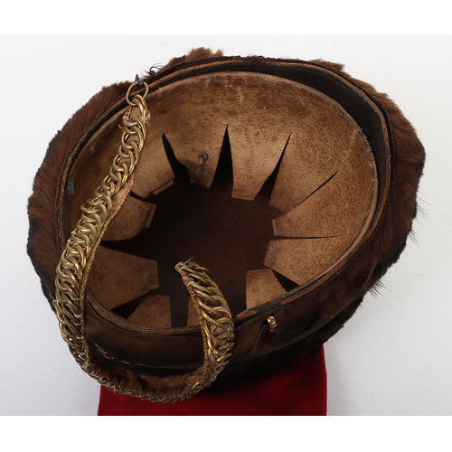 11 - Hussar officers fur busby with scarlet bag having gilt lace & button, fitted with oval gilt cord... 
