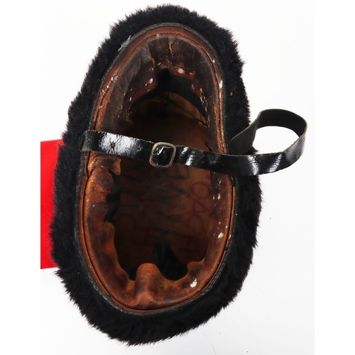 17 - Royal Horse Artillery troopers black fur busby with scarlet bag, leather chin strap. In sound condit... 