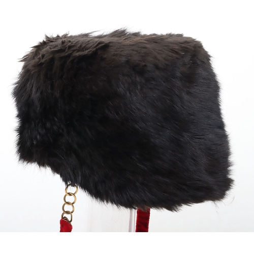 13 - Hussar Officers Busby. Modern hussar officers fur busby with scarlet bag having gilt lace & butt... 