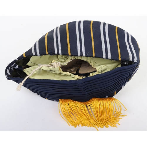 50 - Indian Army Turban, of recent manufacture, made from blue cloth with gilt embroidery. In unissued co... 