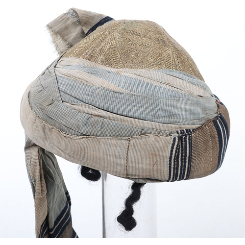53 - Indian Army Turban, made from fawn, grey and blue cloth with gilt embroidery crown. In good conditio... 