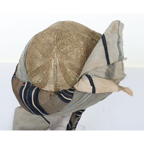 53 - Indian Army Turban, made from fawn, grey and blue cloth with gilt embroidery crown. In good conditio... 