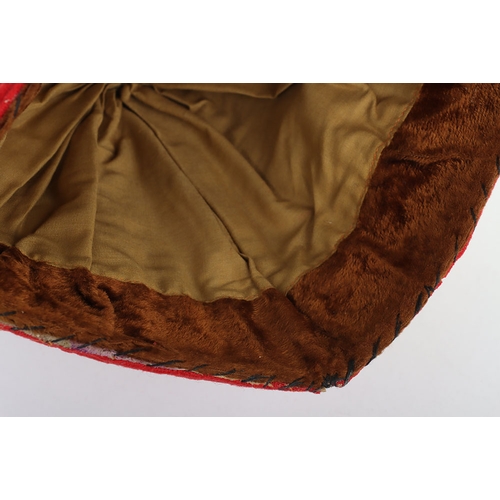 55 - Indian Army Kulla, made from scarlet cloth with gilt embroidery, fawn lining and brown headband stam... 