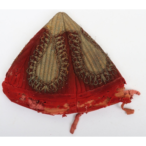 56 - Indian Army Kulla, made from scarlet cloth with gilt embroidery. In poor and damaged condition