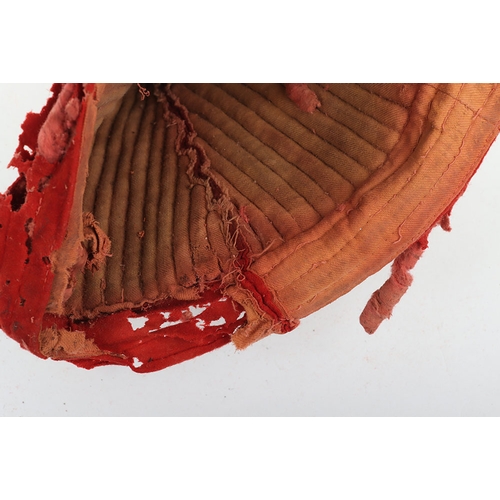 56 - Indian Army Kulla, made from scarlet cloth with gilt embroidery. In poor and damaged condition