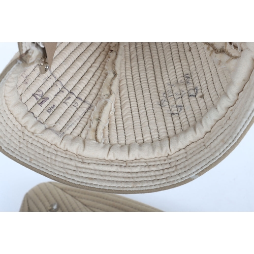 57 - 2x Indian Army Kullas, made from khaki cloth with white lining and official stamps. In very good  un... 