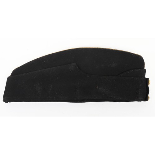 58 - Coldstream Guards Field Service Cap, of dark blue cloth with gilt wire braid to the crown. Regimenta... 