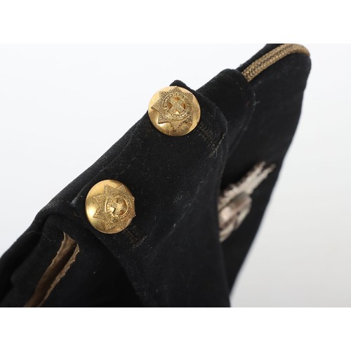 58 - Coldstream Guards Field Service Cap, of dark blue cloth with gilt wire braid to the crown. Regimenta... 