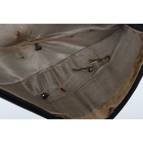 58 - Coldstream Guards Field Service Cap, of dark blue cloth with gilt wire braid to the crown. Regimenta... 