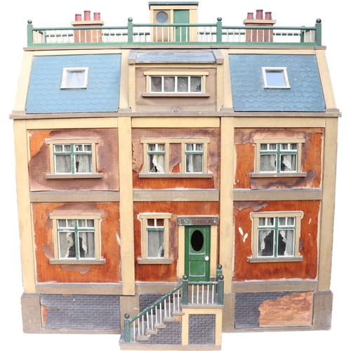 3 - ‘DollyHolme’ an early 20th century well-made wooden dolls house and contents, the painted wooden dol... 