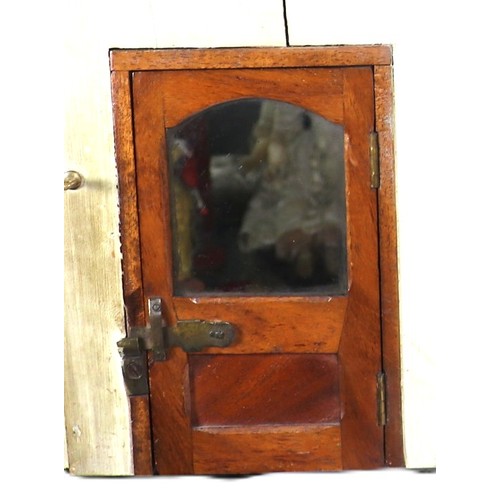 2 - A good painted red brick wooden Victorian Dolls house in the Gothic style, with contents, the façade... 
