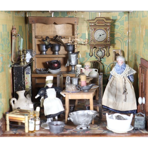 2 - A good painted red brick wooden Victorian Dolls house in the Gothic style, with contents, the façade... 